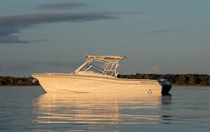 Grady-White Freedom 275 27-foot dual console boat port side sunrise