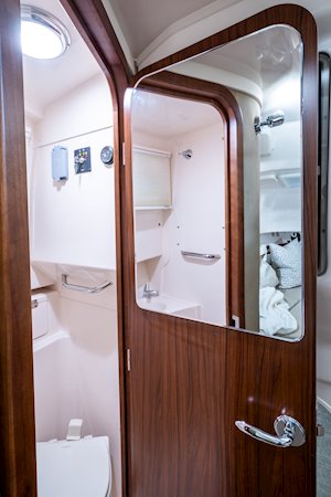 Grady-White Marlin 300 30-foot walkaround cabin boat interior head door with mirror