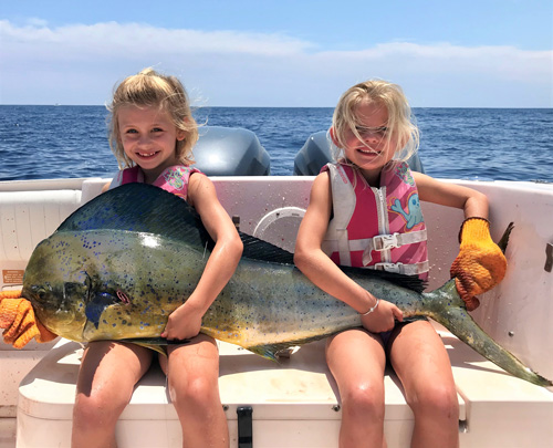 People of all ages experience the joy of fishing on a Grady-White boat.