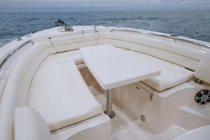 Grady-White Fisherman 236 23-foot center console bow seating with table