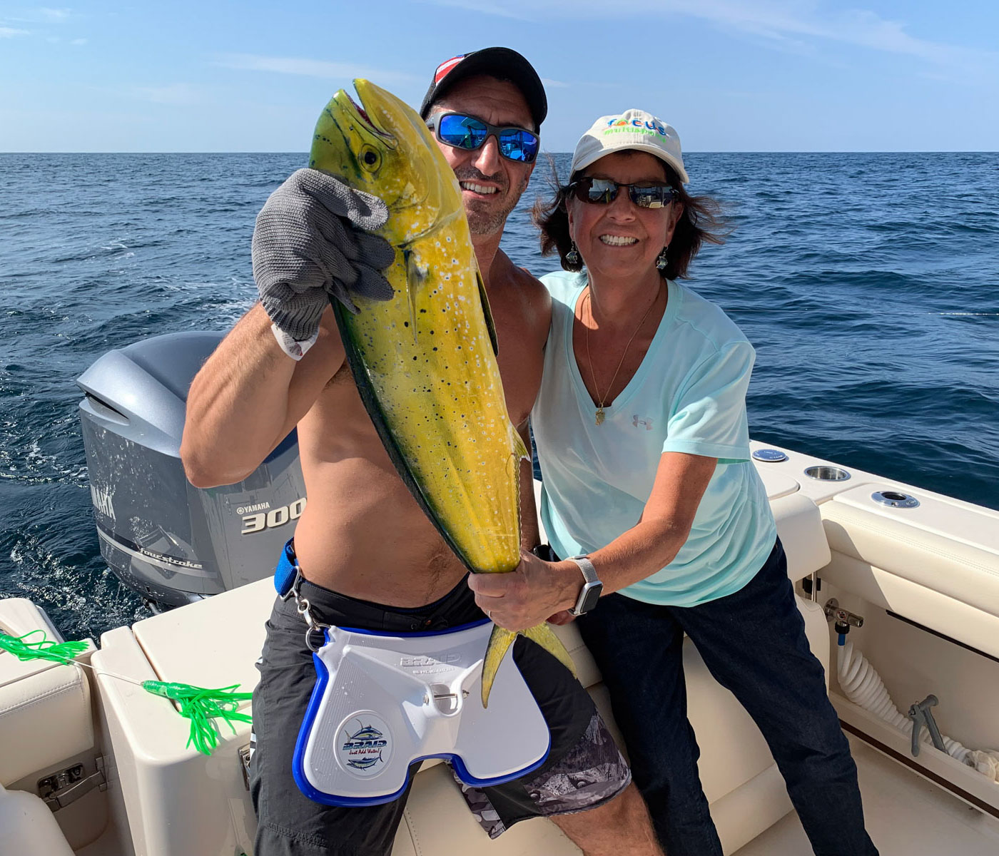 Couple with dolphinfish