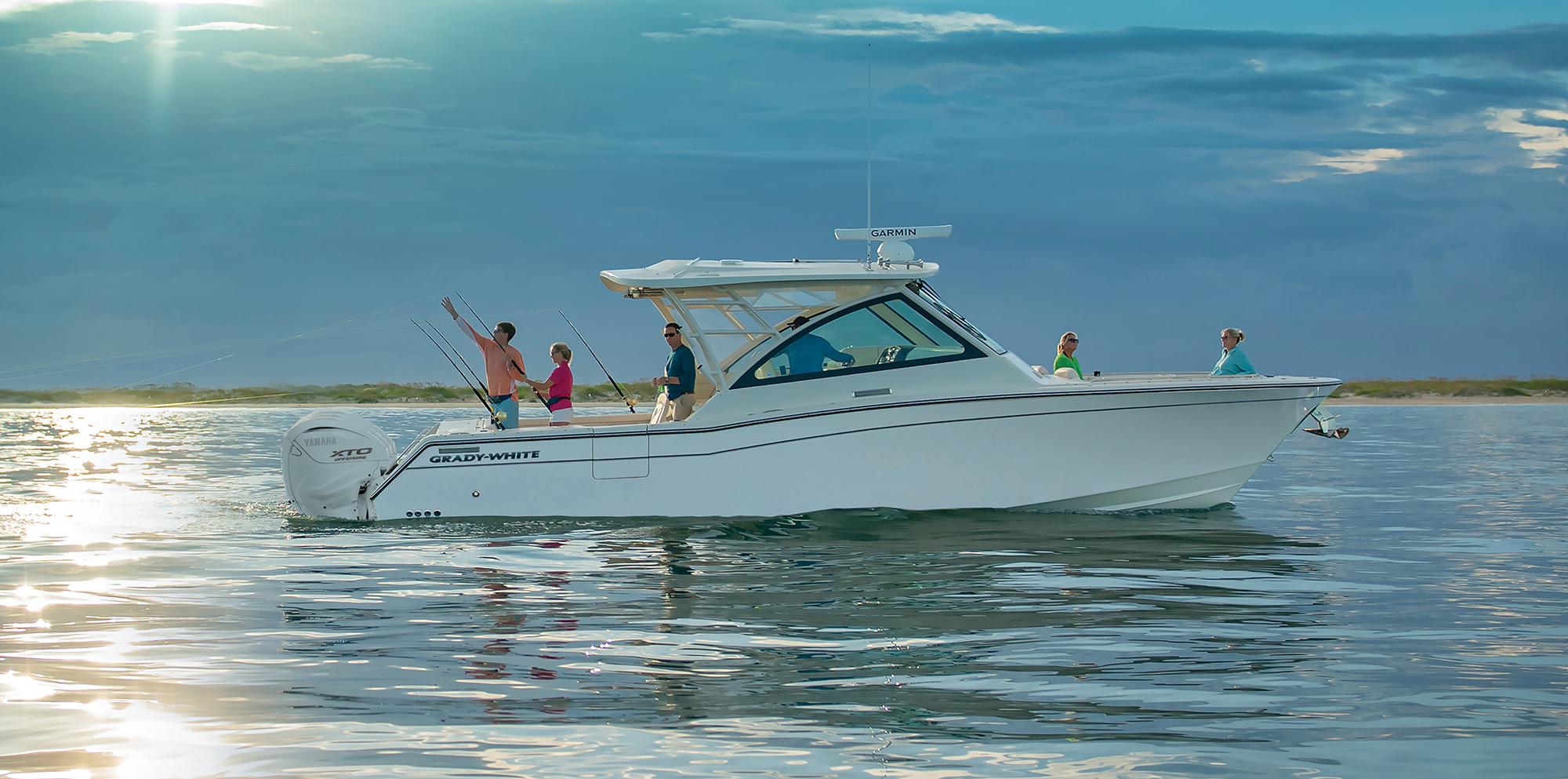 Grady-White Freedom 375 MY2022 37-foot dual console fishing boat fishing at sunrise