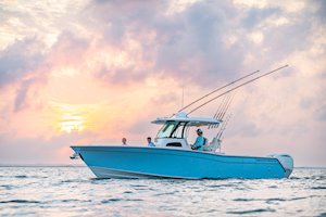 Grady-White Canyon 306 30-foot center console boat on the water port side