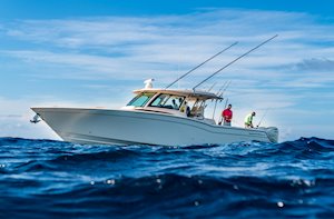 Grady-White Canyon 456 45-foot center console fishing offshore in blue water