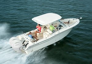 Grady-White Freedom 255 25-foot dual console boat running rear three quarter