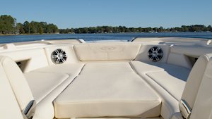 Sun platform insert with cushion on a Grady-White Freedom 345 dual console boat