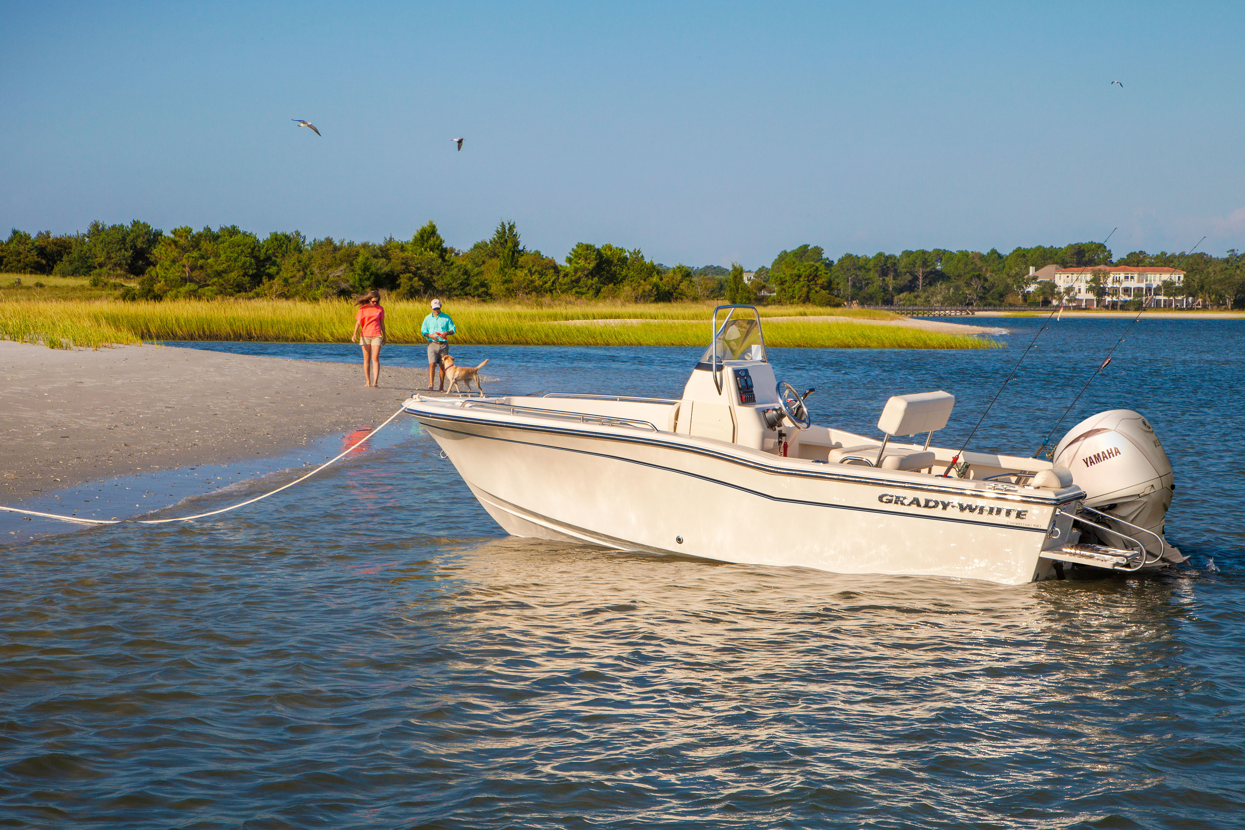 Fisherman 180 center console boat port side at beach