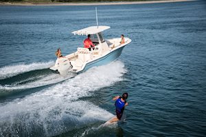 Grady-White Fisherman 216 21-foot center console pulling a wake boarder