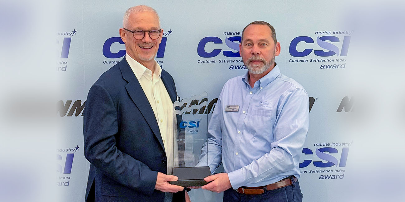 Todd Leggett, Grady-White Boats Dealer/Customer Relations Manager, accepting Grady-White’s 23rd consecutive NMMA Customer Satisfaction Index Award from NMMA President, Frank Hugelmeyer