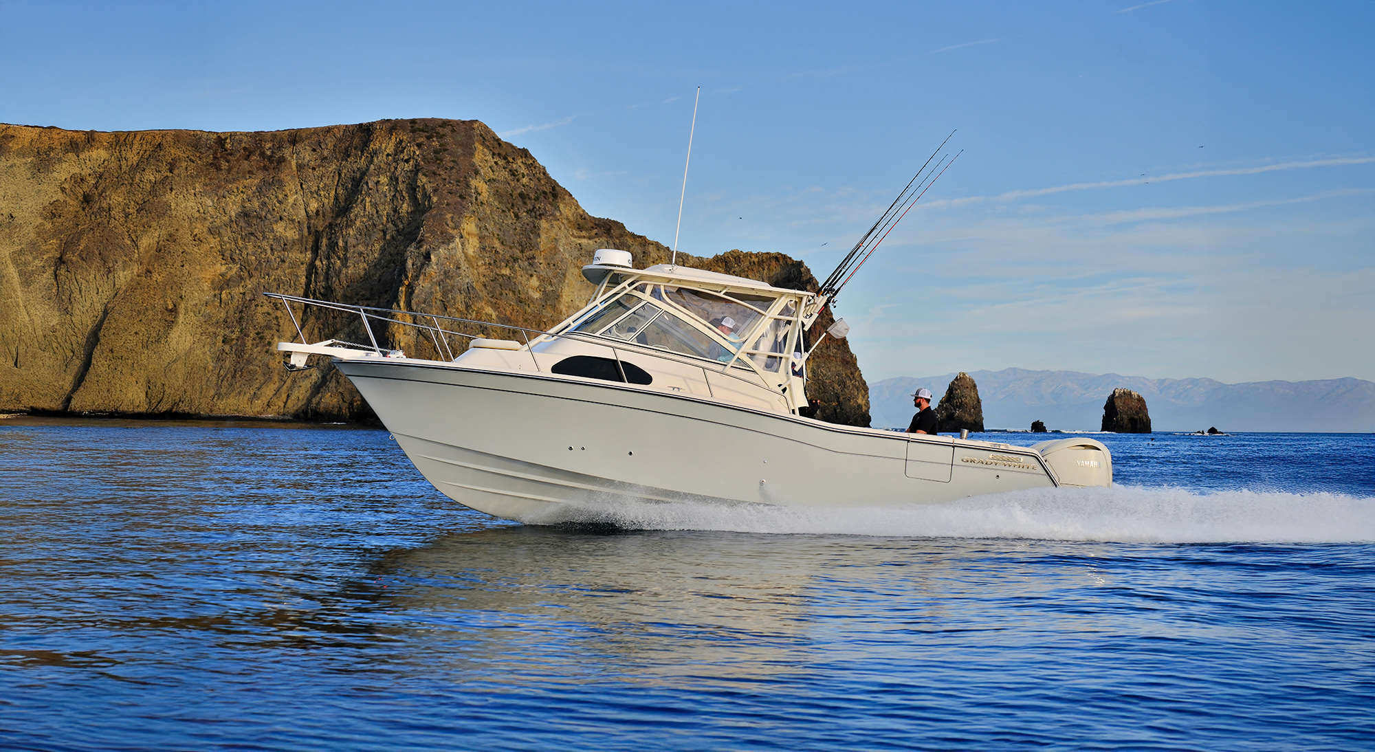 Grady-White Marllin 300 30-foot walkaround cabin running with port side in view