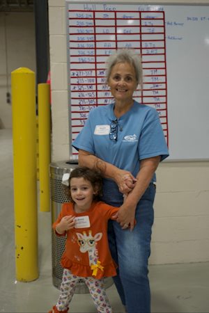 Woman and child posing for camera