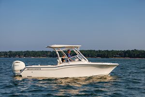 Grady-White Freedom 235 23-foot dual console starboard side cruising