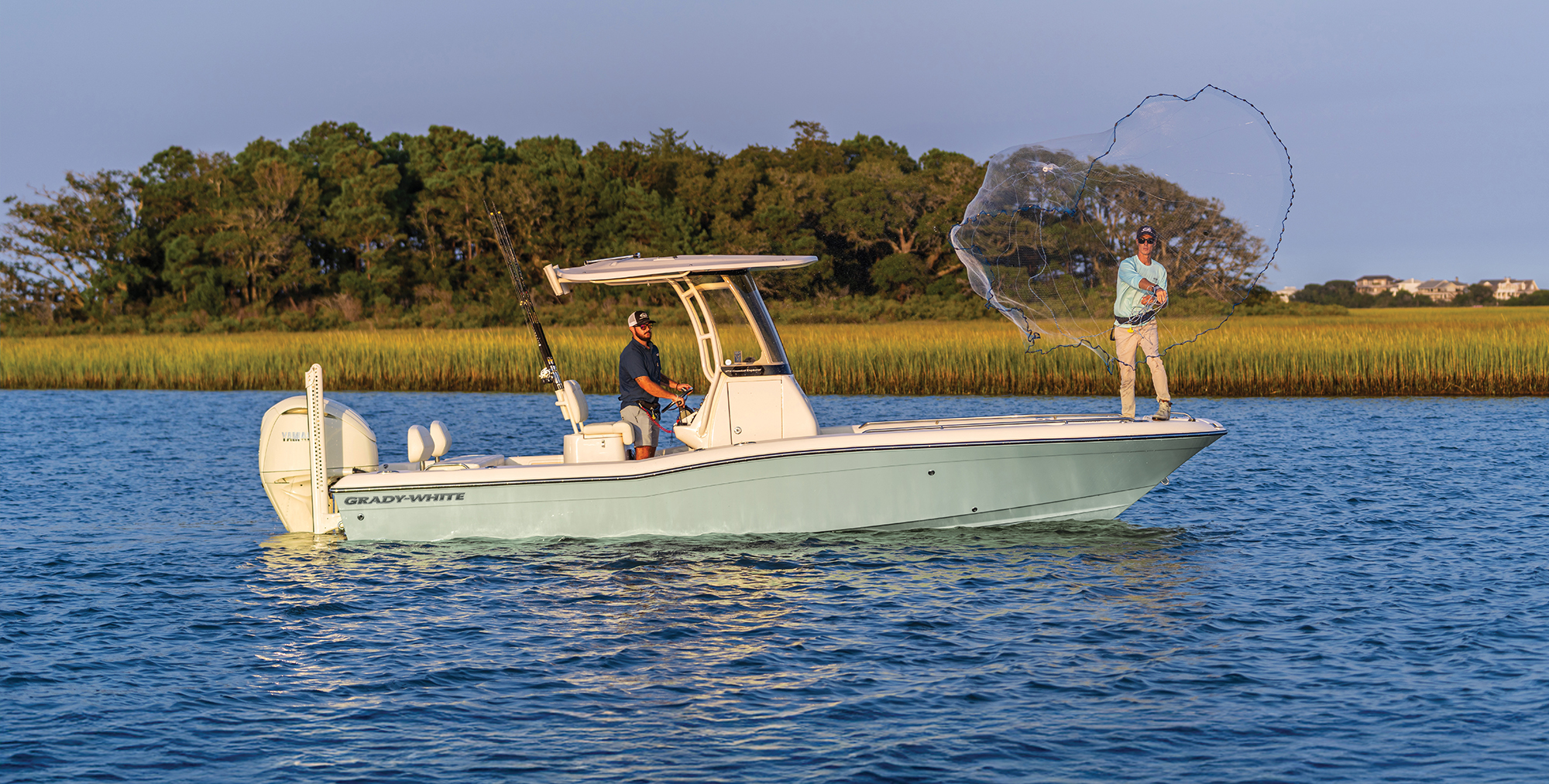 Grady-White 251 CE 25-foot Coastal Explorer fishing boat throwing net