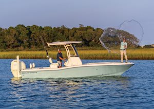 Grady-White 251 CE 25-foot Coastal Explorer fishing boat throwing net