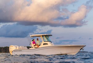 Grady White 281 CE cruising at sunset