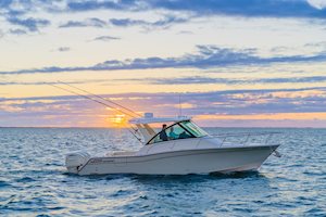 Grady-White Boats Express 340 33-foot Express Cabin starboard side at sunset