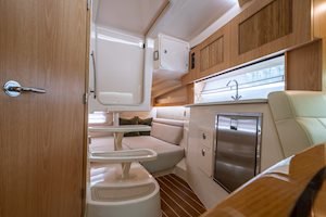 Grady-White Boats Express 340 33-foot Express Cabin boat cabin interior showing galley and aft berth